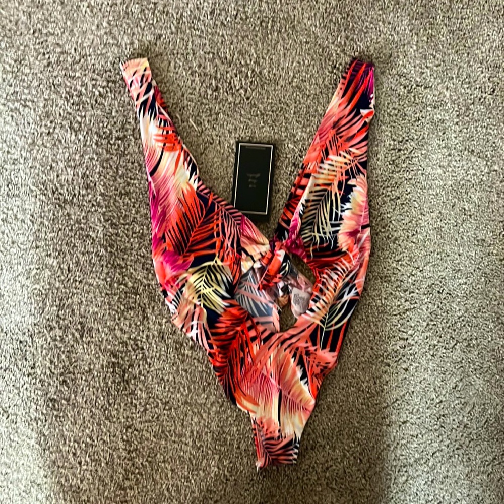 Meek cutout body suit.